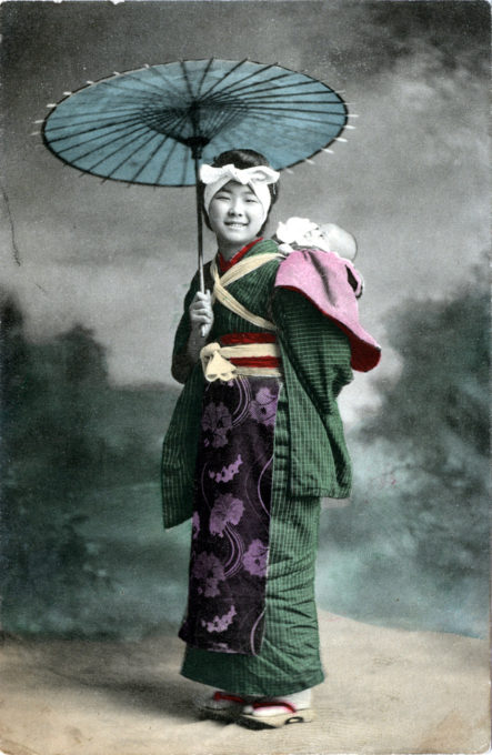 Onnanoko carrying child, c. 1910.